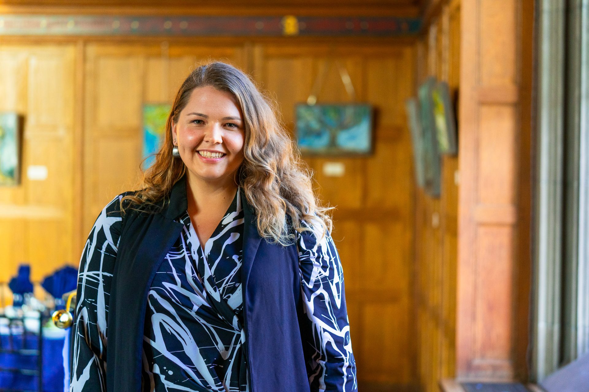 A woman poses for a portrait