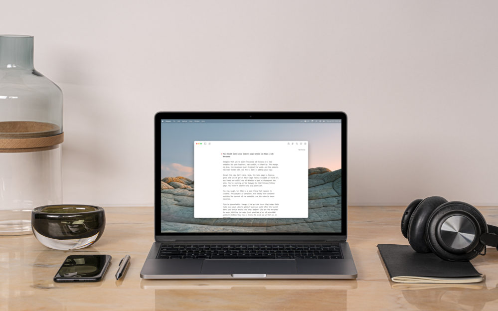 A writing app open on a laptop